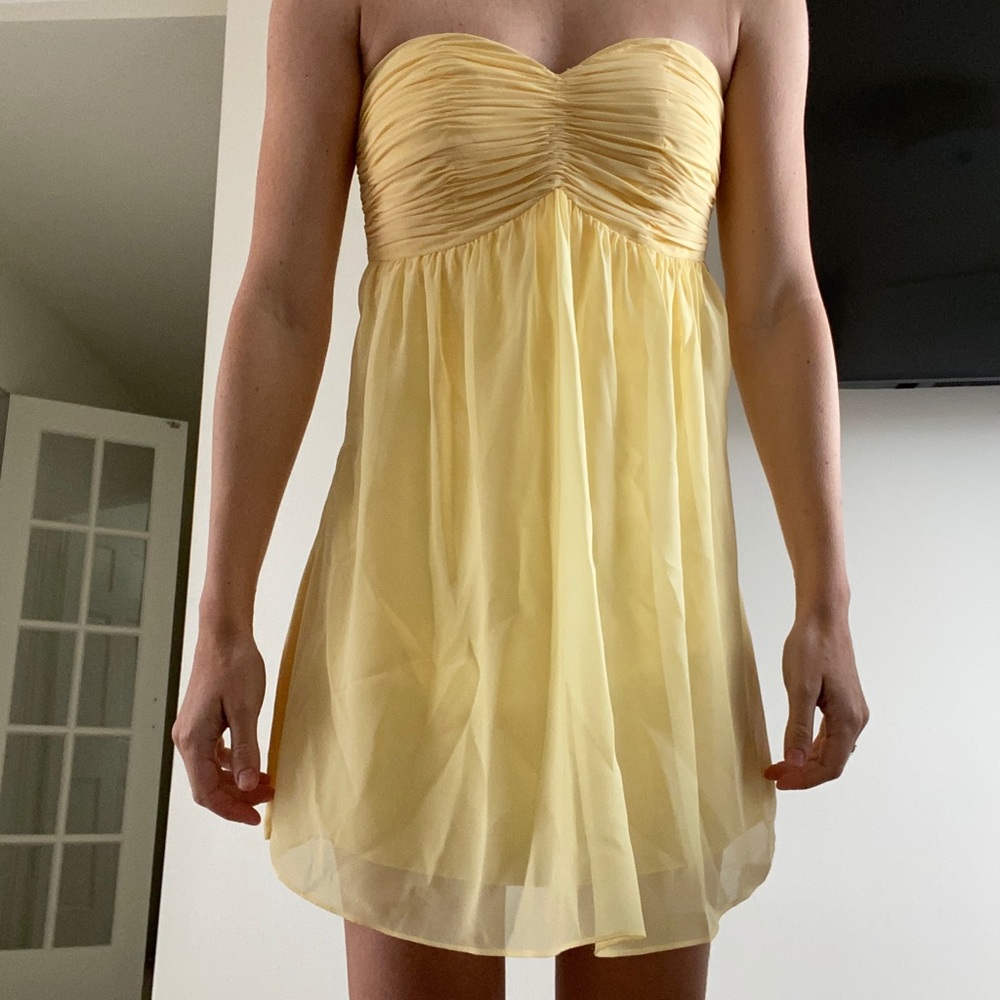 Yellow strapless cocktail dress